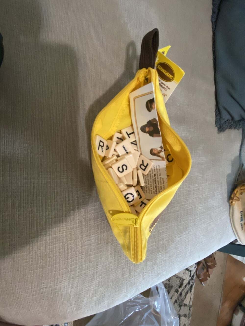 Bananagrams Classic Anagram Word Tile Game in Yellow Banana Pouch